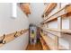 Storage room with wood shelving and water heater at 2720 Lentz Rd, China Grove, NC 28023
