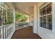 Wooden porch with white railings, wooded view at 2720 Lentz Rd, China Grove, NC 28023