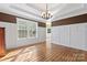 Formal dining room with hardwood floors and wainscoting at 2720 Lentz Rd, China Grove, NC 28023