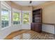 Home office with built-in wooden desk and shelving at 2720 Lentz Rd, China Grove, NC 28023