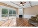 Gathering room with fireplace and sliding doors to deck at 2720 Lentz Rd, China Grove, NC 28023