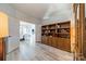Elegant hallway connecting library to dining room at 2014 Newstyle Way, Tega Cay, SC 29708