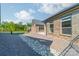 Brick house back with side yard and rock drainage at 2014 Newstyle Way, Tega Cay, SC 29708