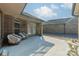 Relaxing patio with seating area and landscaping at 2014 Newstyle Way, Tega Cay, SC 29708