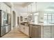 Modern kitchen with farmhouse sink and stainless steel appliances at 2014 Newstyle Way, Tega Cay, SC 29708