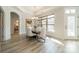 Spacious dining room with a marble table and access to the kitchen at 2014 Newstyle Way, Tega Cay, SC 29708