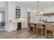 White kitchen with built-in wine cooler and quartz countertops at 1013 Maxwell Ct # 4, Marvin, NC 28173