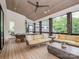 Relaxing screened porch with ample seating and wood flooring at 1013 Maxwell Ct # 4, Marvin, NC 28173