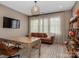 Bright home office with built-in shelving and large windows at 1013 Maxwell Ct # 4, Marvin, NC 28173