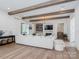 Spacious living room with hardwood floors, exposed beams, and ample natural light at 1013 Maxwell Ct # 4, Marvin, NC 28173