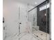 Large walk-in shower with marble and dark tile at 1013 Maxwell Ct # 4, Marvin, NC 28173