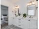 Double vanity bathroom with white cabinets and patterned floor at 1013 Maxwell Ct # 4, Marvin, NC 28173