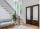Bright and spacious entryway with modern staircase and wood floors at 1013 Maxwell Ct # 4, Marvin, NC 28173