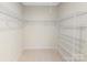 Large walk-in closet featuring ample wire shelving for storage at 216 E Warfield Dr, Mooresville, NC 28115
