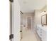 Bathroom with a large vanity, garden tub, and separate shower at 216 E Warfield Dr, Mooresville, NC 28115