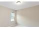 Bedroom with window and neutral walls at 216 E Warfield Dr, Mooresville, NC 28115