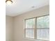 Bedroom with a large window offering a wooded view at 216 E Warfield Dr, Mooresville, NC 28115