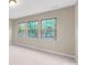 Well-lit bedroom featuring three windows offering natural light at 216 E Warfield Dr, Mooresville, NC 28115