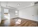 Spacious bedroom filled with natural light and wood-look tile floors at 3206 Whispering Creek Dr # 159, Indian Trail, NC 28079