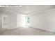 Main bedroom with carpet, neutral walls, and a window at 143 Saidin Ln, Troutman, NC 28166