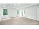 Main bedroom with carpet, neutral walls, and a window at 143 Saidin Ln, Troutman, NC 28166