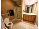 Bathroom with shower, toilet, vanity, and tile floor at 5915 Windy Knoll Ln, Mint Hill, NC 28227