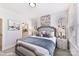 Spacious main bedroom with a plush bed, ample natural light, and en-suite bathroom at 2047 Belmont Terraces Ln # 2, Charlotte, NC 28205