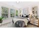 Bright bedroom with a comfortable bed and plenty of windows at 2035 Belmont Terraces Ln # 5, Charlotte, NC 28205