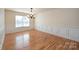 Bright dining room features hardwood floors and elegant wainscoting at 1994 Quill Ct, Kannapolis, NC 28083