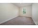 Simple bedroom with window and carpet at 1994 Quill Ct, Kannapolis, NC 28083