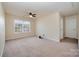 Spacious bedroom with ceiling fan and window at 1994 Quill Ct, Kannapolis, NC 28083