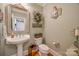 Charming bathroom with pedestal sink, toilet and decorative mirror at 2029 Landry Ln, Rock Hill, SC 29732