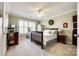 Spacious bedroom with carpeted floor, ceiling fan, and plenty of natural light at 2029 Landry Ln, Rock Hill, SC 29732