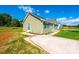 Green house exterior with a side view and landscaping at 414 Drumstand Rd, Stony Point, NC 28678