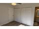 Bedroom with double door closet and window at 1667 Eagles Pl, Rock Hill, SC 29732