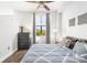 Bedroom with large window, dresser, and queen-size bed at 706 N Davidson St, Charlotte, NC 28202