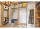 Large walk-in closet with shelving and hanging rods at 706 N Davidson St, Charlotte, NC 28202