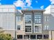 Modern building exterior with gray siding and large windows at 706 N Davidson St, Charlotte, NC 28202