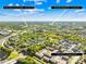 Aerial view highlighting the property's convenient location near shopping and college at 706 N Davidson St, Charlotte, NC 28202