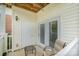 Private patio with seating and access door at 11264 Hyde Pointe Ct, Charlotte, NC 28262