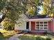 Charming brick and siding home with a covered porch at 704 Mcadenville Rd, Lowell, NC 28098