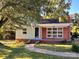 Brick and siding house with walkway and lawn at 704 Mcadenville Rd, Lowell, NC 28098