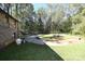 Large backyard with a circular driveway and mature trees at 1630 Shirley Ln, Newton, NC 28656