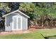 Small storage shed in backyard at 114 Holbrook St, Huntersville, NC 28078