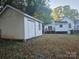 Property features a detached shed and a deck at 508 S Yadkin Ave, Spencer, NC 28159