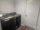Bright laundry room with washer and dryer at 508 S Yadkin Ave, Spencer, NC 28159