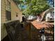 Side yard with chain link fence and AC unit at 201 Deer Park Rd, Mount Gilead, NC 27306