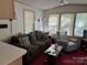 Relaxing living room with comfortable seating at 201 Deer Park Rd, Mount Gilead, NC 27306