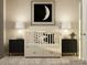 Bedroom with crib, nightstands, and moon artwork at 123 Dorian Pl, Troutman, NC 28166