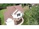 Aerial view of a two-story house with brown roof and landscaped yard at 818 Bradberry Ln, Indian Trail, NC 28079